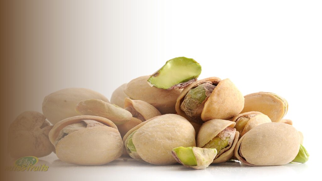 Fresh shelled pistachios showing the pistachio nuts benefits of a low-calorie, high-protein snack